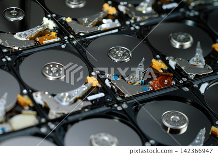 one bitcoin isolated standing belong naked hard disk drives with reflection on data disc for background wallpaper in internet business finance crypto currency banking scene one bitcoin isolated standing belong naked hard disk drives with reflection on data disc for background wallpaper in internet business finance crypto currency banking scene 142366947
