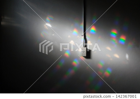 wall plug with steel electric wire tube on the concrete wall in light and shade wall plug with steel electric wire tube on the concrete wall in light and shade 142367001