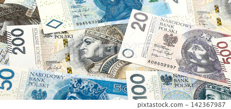 Big amount of polish zloty money bills banknotes close up. Huge pile of cash of Poland currency Big amount of polish zloty money bills banknotes close up. Huge pile of cash of Poland currency 142367987
