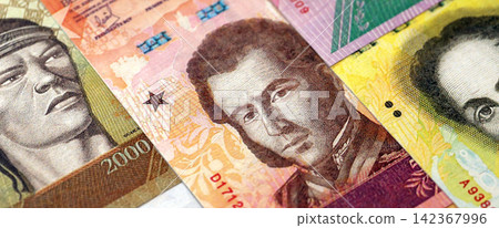 Venezuelan Bolivar currency money bills in big amount. Stack of VED currency banknotes Venezuelan Bolivar currency money bills in big amount. Stack of VED currency banknotes 142367996