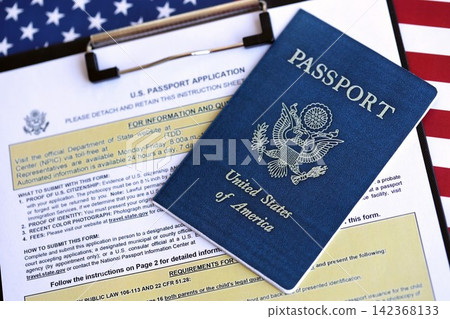 Department of State form DS11 Application for a U.S. Passport lies on table Department of State form DS11 Application for a U.S. Passport lies on table 142368133