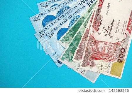 Nigerian naira money bills in big amount. Finance and banking concept Nigerian naira money bills in big amount. Finance and banking concept 142368226