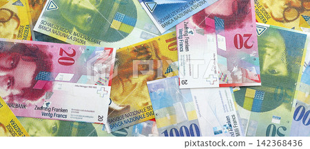 Swiss franc banknotes. The current francs money bills lies on table Swiss franc banknotes. The current francs money bills lies on table 142368436