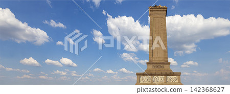 Monument to the People's Heroes at the Tiananmen Square (against the sky with clouds), Beijing, China. Translation of the inscription on the monument: Eternal glory to the people's heroes... Monument to the People's Heroes at the Tiananmen Square (against the sky with clouds), Beijing, China. Translation of the inscription on the monument: Eternal glory to the people's heroes... 142368627