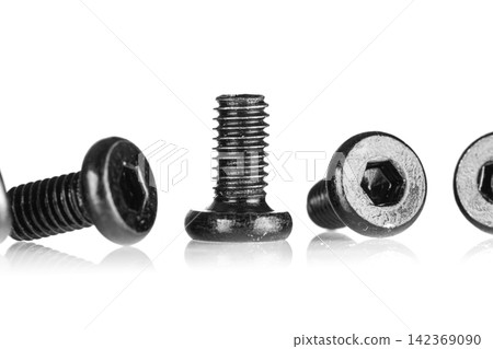 hex socket head screw in black color on isolated white background hex socket head screw in black color on isolated white background 142369090