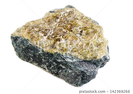 macro mineral stone grossular on a white background macro mineral stone grossular on a white background 142369268