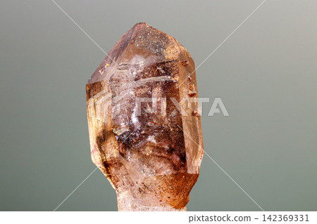 macro mineral stone smoky quartz on a black background macro mineral stone smoky quartz on a black background 142369331