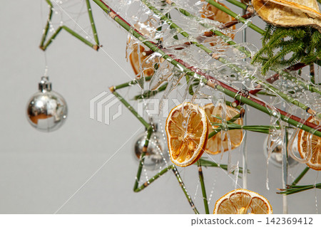 Christmas composition of flowers and Christmas decorations Christmas composition of flowers and Christmas decorations 142369412
