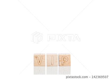 Wooden cubes with letters vip on a white background 142369507
