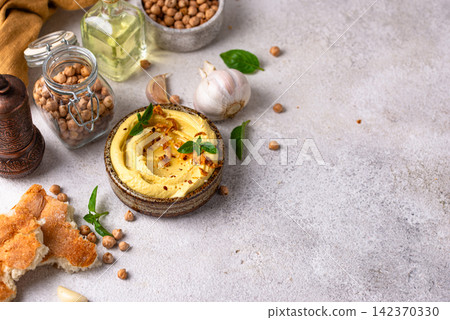 Traditional hummus with chickpeas, paprika, olive oil Traditional hummus with chickpeas, paprika, olive oil 142370330