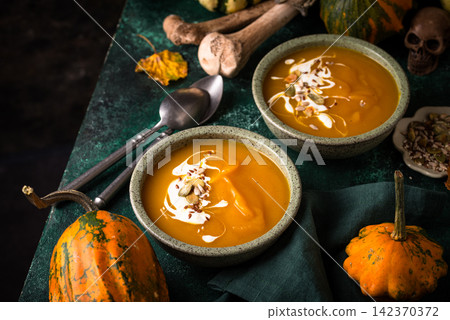 Vegetarian autumn pumpkin cream soup Vegetarian autumn pumpkin cream soup 142370372