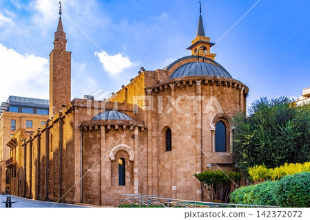 Historic Mosque with Minaret and Stone Domes in Blue Sky Historic Mosque with Minaret and Stone Domes in Blue Sky 142372072
