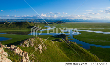 Panoramic River Wetland Landscape with Green Mountains Panoramic River Wetland Landscape with Green Mountains 142372084