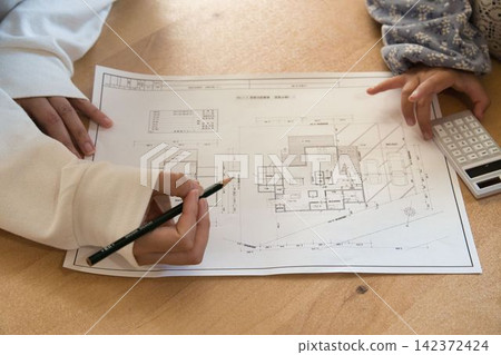 Explained using a floor plan of a custom-built house. 142372424