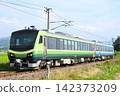 The HB-E300 series Aizu SATONO train travels along the Ban'etsu West Line towards Koriyama. 142373209