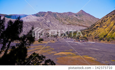 Beautiful morning view of Mount Bromo and Mount Semeru, East Java, Indonesia. 142373710