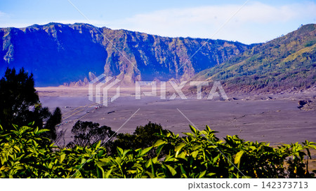 Beautiful morning view of Mount Bromo and Mount Semeru, East Java, Indonesia. 142373713