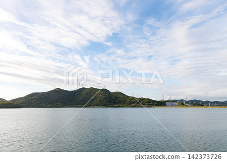 Lake Hiraso (Kakogawa, Hyogo Prefecture) as seen from a walking path. Lake Hiraso (Kakogawa, Hyogo Prefecture) as seen from a walking path. 142373726