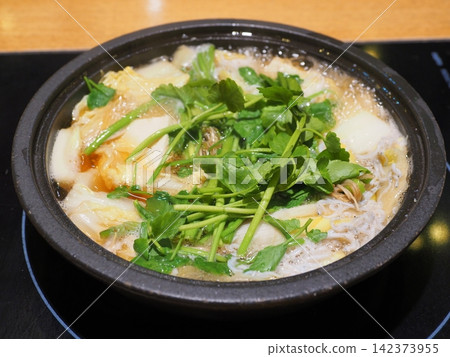 A winter specialty dish from Miyagi/Sendai: Seri Nabe (a hot pot dish with plenty of Japanese parsley). A winter specialty dish from Miyagi/Sendai: Seri Nabe (a hot pot dish with plenty of Japanese parsley). 142373955
