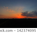 Sunset over rice fields and mountain ranges 142374095