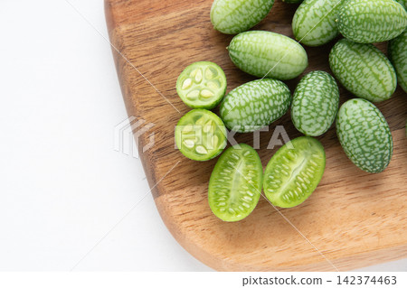 Cross-section of a sliced mini cucumber 142374463