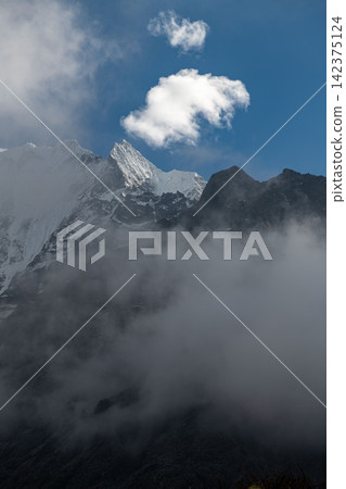 Ama Dablam as seen from the Everest Base Camp trail in Nepal Ama Dablam as seen from the Everest Base Camp trail in Nepal 142375124