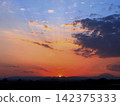 Sunset over the mountain range and the twilight sky 142375333