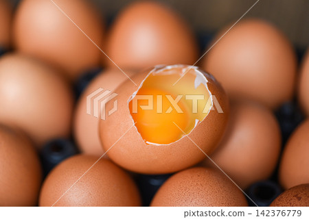 Chicken eggs collect from farm products natural healthy eating concept / Fresh broken egg yolk Chicken eggs collect from farm products natural healthy eating concept / Fresh broken egg yolk 142376779