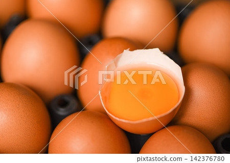 Chicken eggs collect from farm products natural healthy eating concept - Fresh broken egg yolk Chicken eggs collect from farm products natural healthy eating concept - Fresh broken egg yolk 142376780