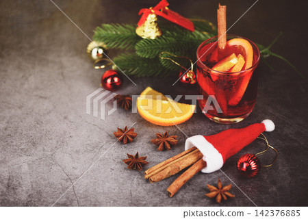 Christmas mulled wine delicious holiday like parties with orange cinnamon star anise spices for traditional christmas drinks winter holidays Christmas mulled wine delicious holiday like parties with orange cinnamon star anise spices for traditional christmas drinks winter holidays 142376885
