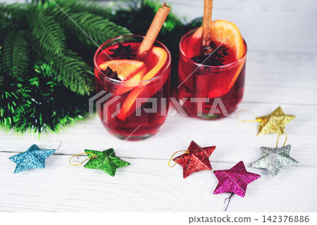 Christmas mulled wine delicious holiday like parties with orange cinnamon star anise spices for traditional christmas drinks winter holidays Christmas mulled wine delicious holiday like parties with orange cinnamon star anise spices for traditional christmas drinks winter holidays 142376886
