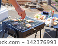 Budget-friendly BBQ with yakitori due to rising prices. 142376993