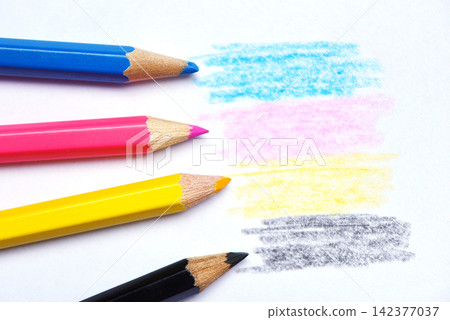 cmyk concept - wooden crayon texture with cyan blue red magenta yellow and black drawings on white paper background cmyk concept - wooden crayon texture with cyan blue red magenta yellow and black drawings on white paper background 142377037