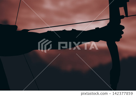 Archer Silhouette Aiming Bow at Sunset Archer Silhouette Aiming Bow at Sunset 142377859