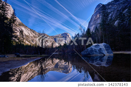 Yosemite Mountain Lake Reflection with Granite Cliffs and Blue Sky 142378143