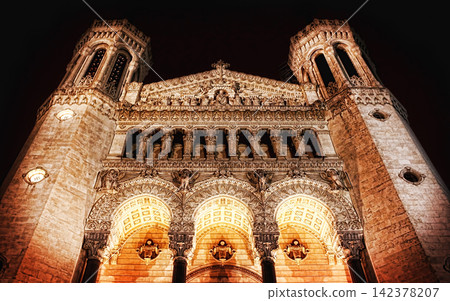 Illuminated Historic Basilica Facade at Night Illuminated Historic Basilica Facade at Night 142378207