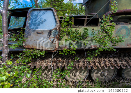 Old Soviet GT-SM GAZ-71 tracked all-terrain vehicle overgrown in forest in Murmansk Oblast, Russia Old Soviet GT-SM GAZ-71 tracked all-terrain vehicle overgrown in forest in Murmansk Oblast, Russia 142380322