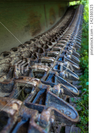 Old Soviet GT-SM GAZ-71 tracked all-terrain vehicle overgrown in forest in Murmansk Oblast, Russia 142380325