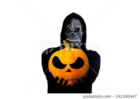 Creepy person in a black hooded cloak and skull mask holding a carved Halloween pumpkin isolated on a white background. Holiday, horror, and celebration concept Creepy person in a black hooded cloak and skull mask holding a carved Halloween pumpkin isolated on a white background. Holiday, horror, and celebration concept 142380447