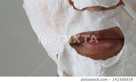 A man wearing a face mask A man wearing a face mask 142380939