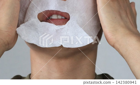 A man wearing a face mask A man wearing a face mask 142380941