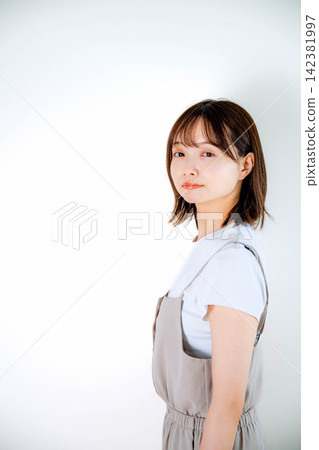 Portrait of a woman with a charming smile Portrait of a woman with a charming smile 142381997