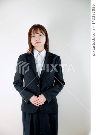young business woman in a suit young business woman in a suit 142382089