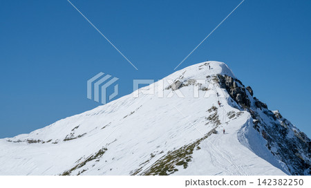 View of the summit of Mt. Karamatsu from the mountain hut at the top of Mt. Karamatsu in winter. View of the summit of Mt. Karamatsu from the mountain hut at the top of Mt. Karamatsu in winter. 142382250