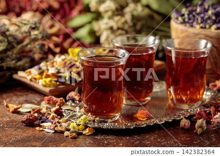 Herbal tea and a mix of various dried medicinal plants and herbs. Herbal tea and a mix of various dried medicinal plants and herbs. 142382364