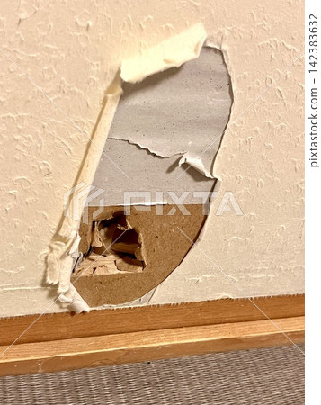 A sliding door with a hole in it A sliding door with a hole in it 142383632