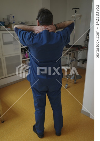 Muscular pain after working at the hospital Muscular pain after working at the hospital 142383952