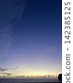 Sunset over the horizon 142385125