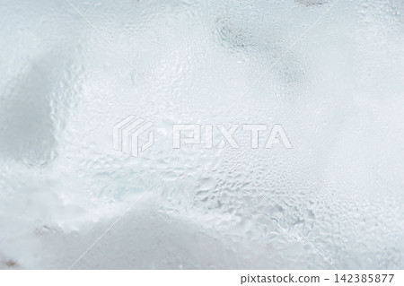18 Macro photographs taken in a studio of water droplets formed in a glass filled with crushed ice. 18 Macro photographs taken in a studio of water droplets formed in a glass filled with crushed ice. 142385877