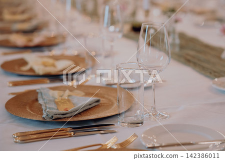 Gourmet dining experience with exquisite dish presentation. Fine wedding dining and culinary art. Gourmet dining experience with exquisite dish presentation. Fine wedding dining and culinary art. 142386011